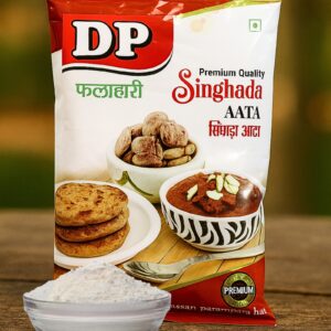 Pack of DP Pure Singhada Flour (250 g) with a bowl of trishul-coated flour and sabudana khichdi in the background